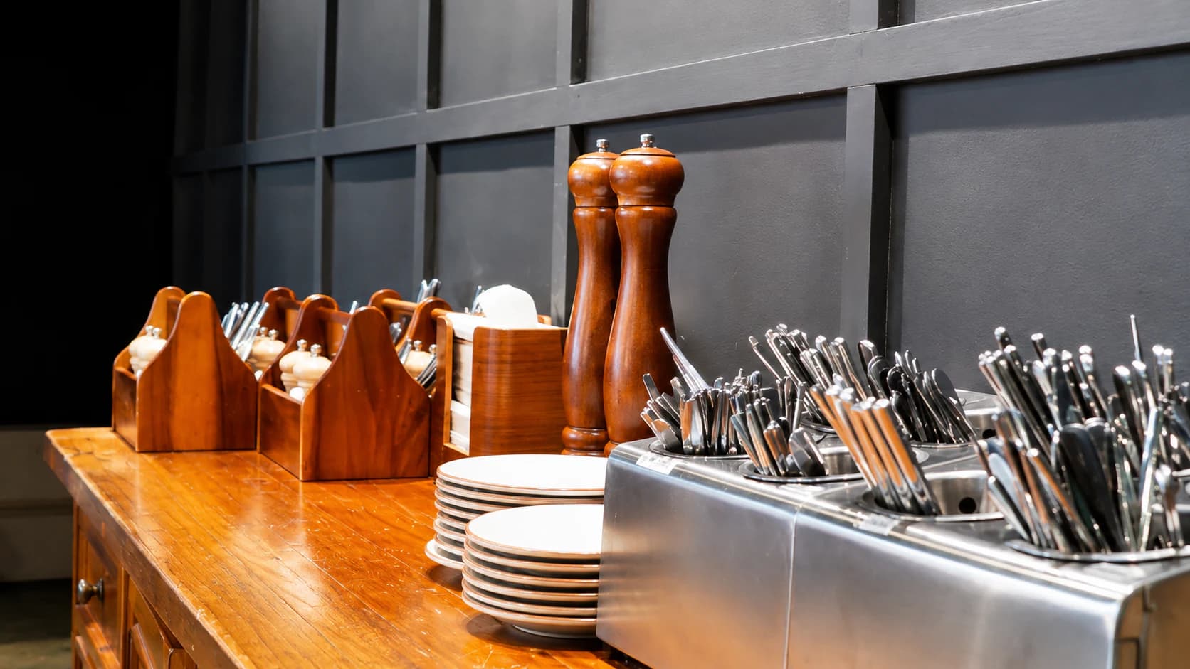 Plates, cutlery and timber table service inside Bridges Hill Bistro
